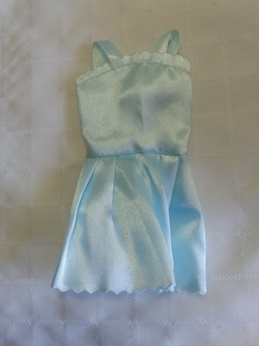 B - 3 mini Barbie dresses in various colors